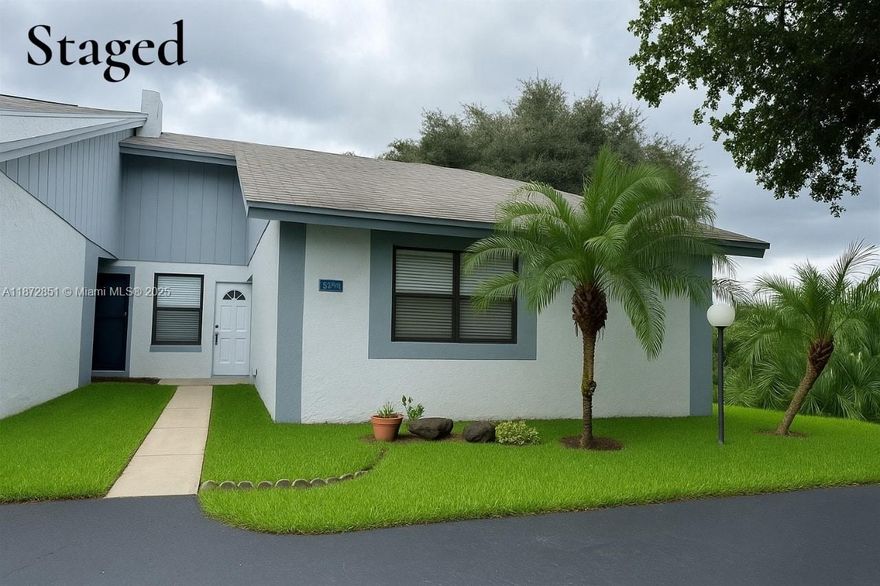Charming and move-in ready corner townhouse featuring 2 bedrooms and 2 bathrooms, 2 parking spaces. The updated kitchen offers granite countertops and stainless steel appliances. Enjoy the convenience of an in-unit washer and dryer. Relax or entertain in your private fenced patio while taking in the water view. Nestled in a peaceful neighborhood, this property offers a low monthly condo fee, making it an excellent investment opportunity or perfect starter home!