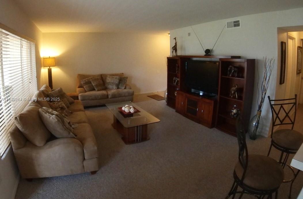 Fully rented investment property offering immediate cash flow. Located minutes from major highways and shopping centers, with long-term tenants in place. Built on a large natural forest and overlooking a real lake, with 1,256 square feet, with 2 bedrooms and 2 bathrooms. Located on the ground floor and with access to a large garden and the lake, this property is a fine example to live with a natural living painting seen from the living room and dining room of the apartment. The condominium has several amenities, such as a gym, tennis courts, dock and recreation areas. Pets are accepted in this community. Or if you want it as an investment, it is currently rented, generating income from the moment you buy it. A/c was replaced on 11/2021. Allow 24 hours to schedule a showing.
