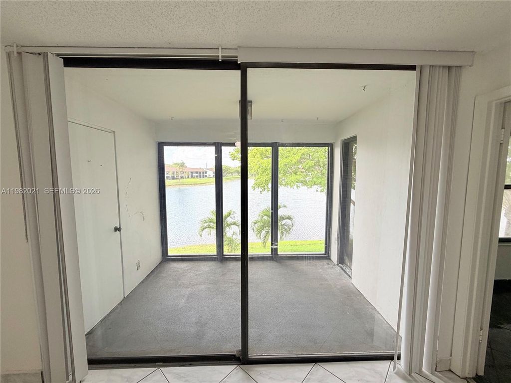 Photo of 206 Lake Pointe Dr #206, Oakland Park, FL 33309 (MLS # A11982021)