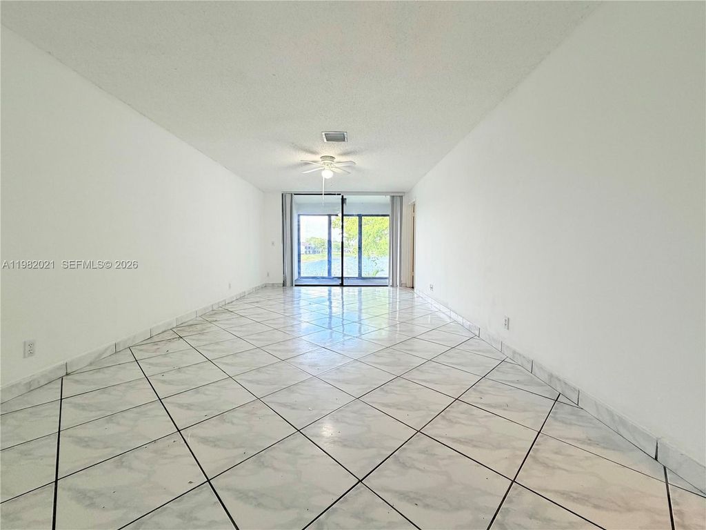Photo of 206 Lake Pointe Dr #206, Oakland Park, FL 33309 (MLS # A11982021)