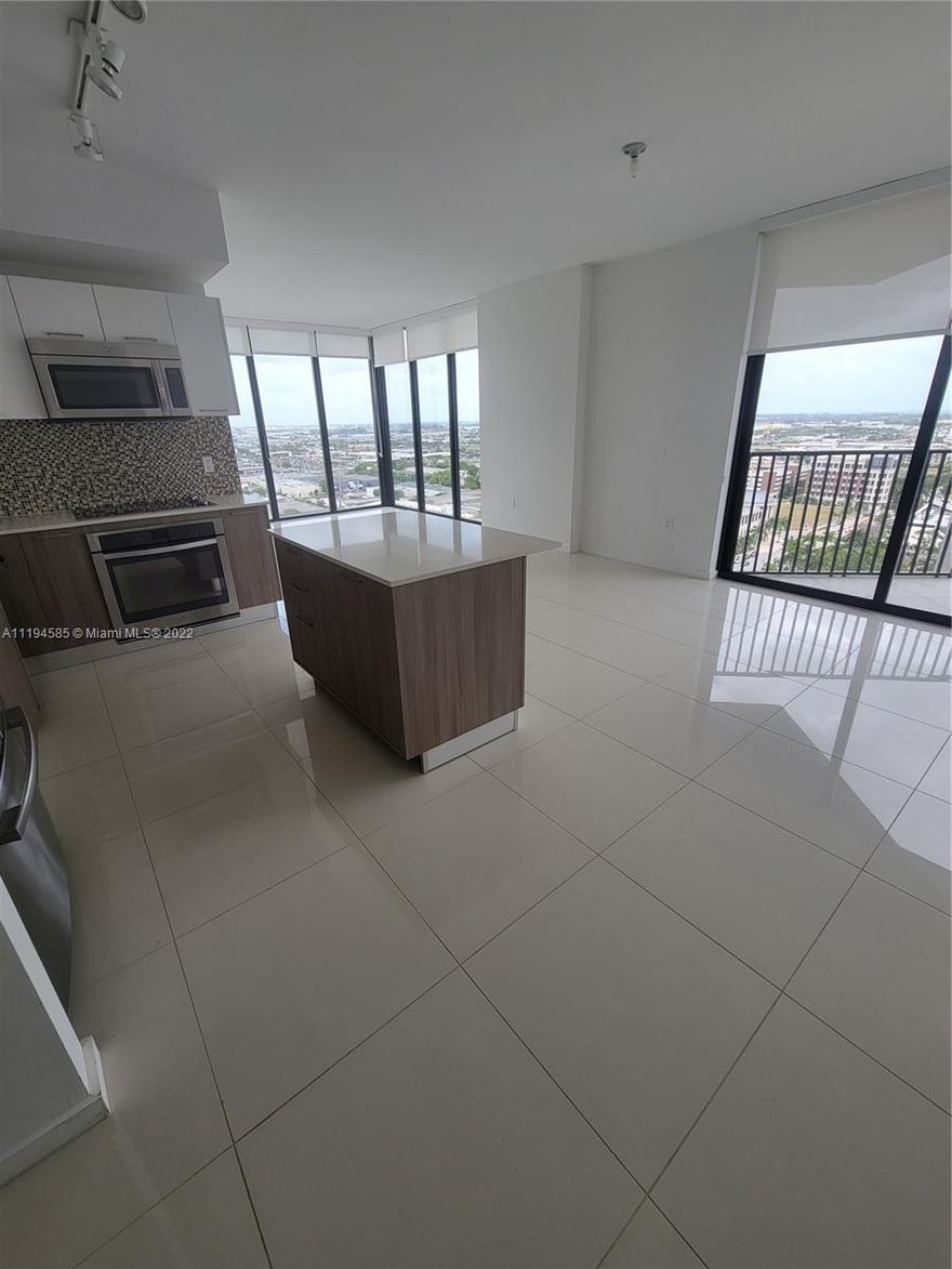 Great Views. 2 bedrooms, 2 bath. Porcelain floors throughout. European Style kitchen with high end SS appliances, quartz counter top with island.  Modern & Elegant building with amazing resort style amenities: Gym, Sauna, Massage room, Spinning area, Conference room, delightful Children playroom, Concierge. A breathtaking infinity pool and social area. Internet with new wireless technology, Basic Cable and Water included. steps to restaurants and shops. A+ Downtown Doral Charter Elementary School.    TENANT INSURANCE IS REQUIRED.