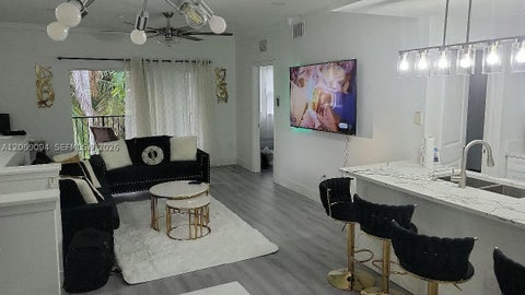 Photo of 5840 W Sample Rd #302, Coral Springs, FL 33067 (MLS # A12069094)