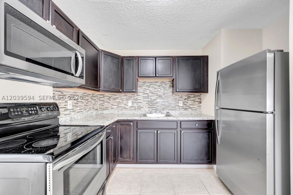 Photo of 2610 Riverland Dr #A, Fort Lauderdale, FL 33312 (MLS # A12039594)