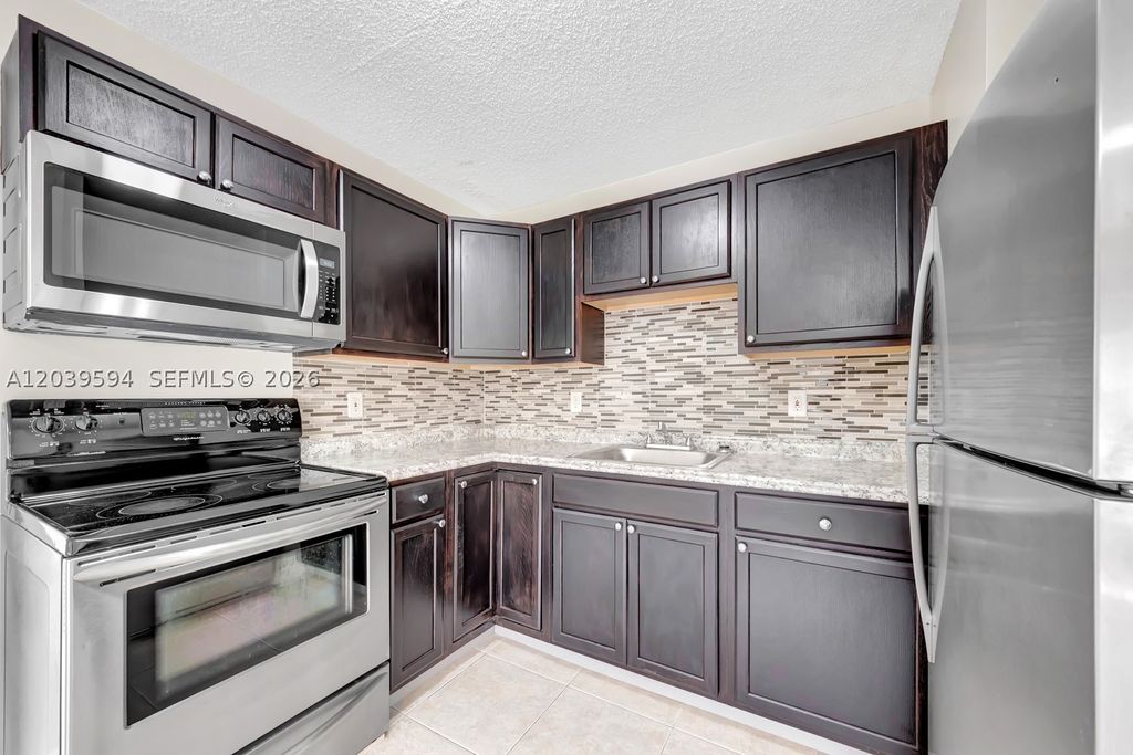 Photo of 2610 Riverland Dr #A, Fort Lauderdale, FL 33312 (MLS # A12039594)