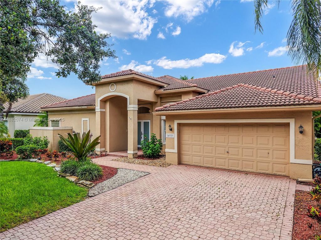 Photo of 10337 NW 53rd Ct, Coral Springs, FL 33076 (MLS # A11882074)