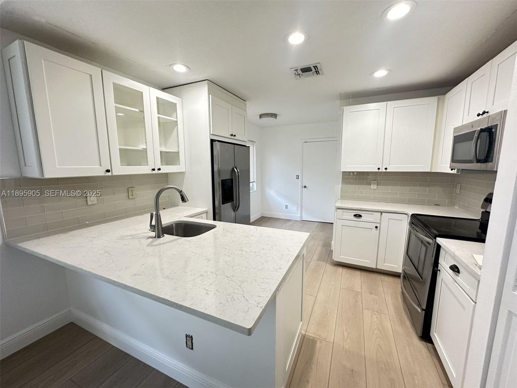 Photo of 2917 Myrtle Oak Cir, Davie, FL 33328 (MLS # A11895905)