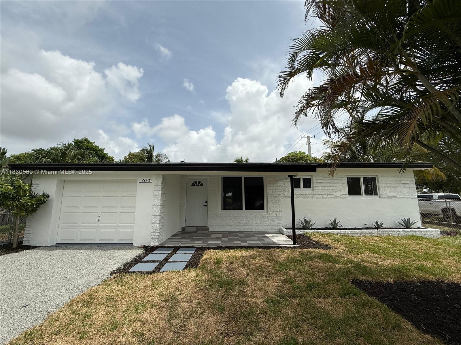 Beautiful, completely remodeled 3/3 corner lot home in Miramar. New Roof, New Ac, New kitchen with stainless steel appliances. New bathrooms, new flooring. Nice layout throughout the home. Spacious yard with covered terrace perfect for entertaining. Close to major highways, schools etc.