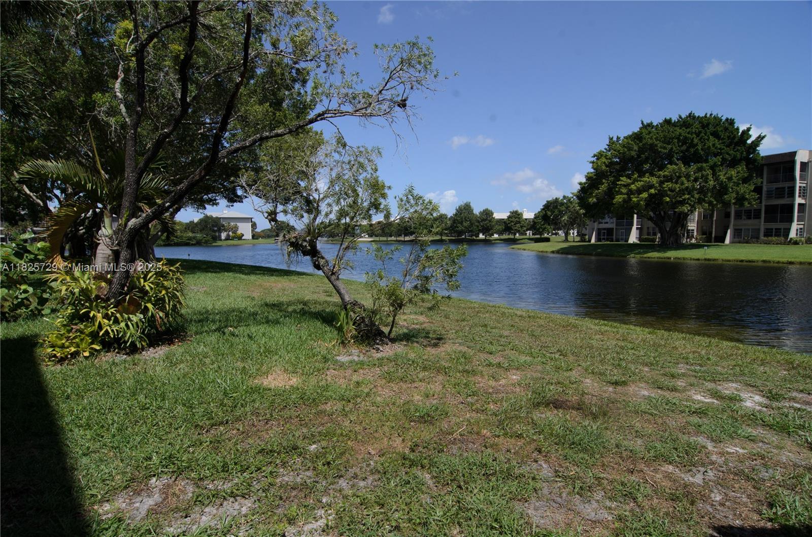 BEAUTIFUL 2 BED, 2 BATH FIRST FLOOR CONDO W GORGEOUS WATER VIEWS IN PINE ISLAND RIDGE, DAVIE. THE SUNROOM PROVIDES YOU EXTRA OUTDOOR SPACE TO SIT WHILE RELAXING WITH A BOOK OR YOUR PET! YOU WILL ALSO HAVE A MEMBERSHIP TO THE PINE ISLAND RIDGE COUNTRY CLUB & CAN PARTAKE IN MANY FUN ACTIVITIES SUCH AS PICKLEBALL, GOLF, FITNESS CENTER, TWO ON SITE RESTAURANT & SPORTS BAR DOWNSTAIRS, AND THE LAKE VIEW UPSTAIRS, SAUNA/STEAM ROOM, TENNIS & A POOL, MUST PAY $175 ANNUALLY FOR CLUB CARD. SO MUCH TO CALL HOME YOU'LL NEVER HAVE TO GO ANYWHERE ELSE! CLOSE TO RESTAURANTS, SHOPS, WHOLE FOODS & WALKING DISTANCE TO PUBLIX. PLUS ITS DESIGNATED FOR ALL GRADE A SCHOOLS FROM ELEMENTARY TO HIGH SCHOOL! CLOSE TO NOVA UNIVERSITY!! THIS ONE WILL NOT LAST! Tenants moving out 08-15-2025. 9 ATTACHEMENTS IN LISTING