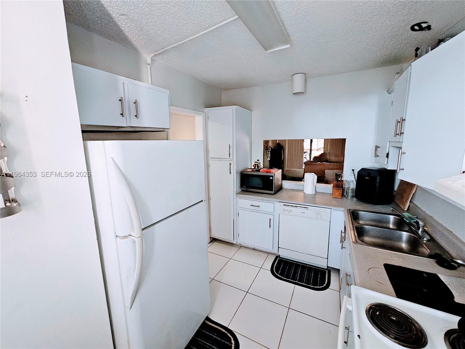 GREENGLADES CONDO II - Residential Lease