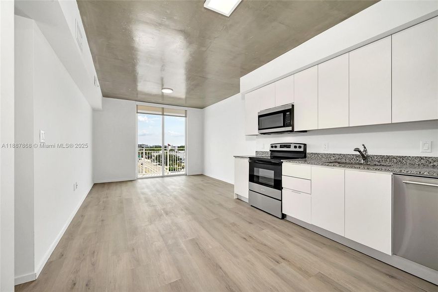 Introducing a brand-new boutique building on 125th Street! This elegant 2-bedroom, 1-bath unit features a spacious balcony and sleek laminate flooring throughout. a live-work unit is a space that combines your workspace with your living quarters so you essentially work from home but with a dedicated section for your office. .The building offers amenities, including a gym, a conference room, and secure access with a fob-operated elevator. We also offer Electric Vehicle charging stations on site . Pet-friendly and equipped with an in-unit washer and dryer, as well as a fully equipped kitchen. Enjoy a quick and easy application process with just the first month's rent and a security deposit required. Call today!!!