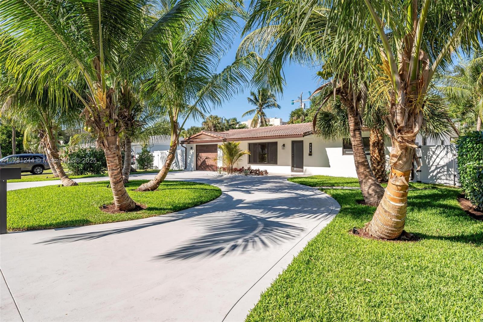 Price reduced!! Welcome to "The Mango House" — a standout residence tucked within the historic charm of Old Floresta, in the heart of Boca Raton. Brimming with natural light, The spacious living room boasts a striking vaulted ceiling with exposed wood beams, while the sleek chef’s kitchen features Viola porcelain surfaces, a breakfast bar island, and high-end Café and LG appliances.
Wide-plank wood flooring adds warmth throughout. Impact windows, doors, and sliders open to a private backyard retreat with a covered loggia, BBQ pergola, heated pool, and generous patio — all fenced for ultimate privacy and relaxed tropical living.
Currently rented till September, This turnkey gem comes fully furnished.