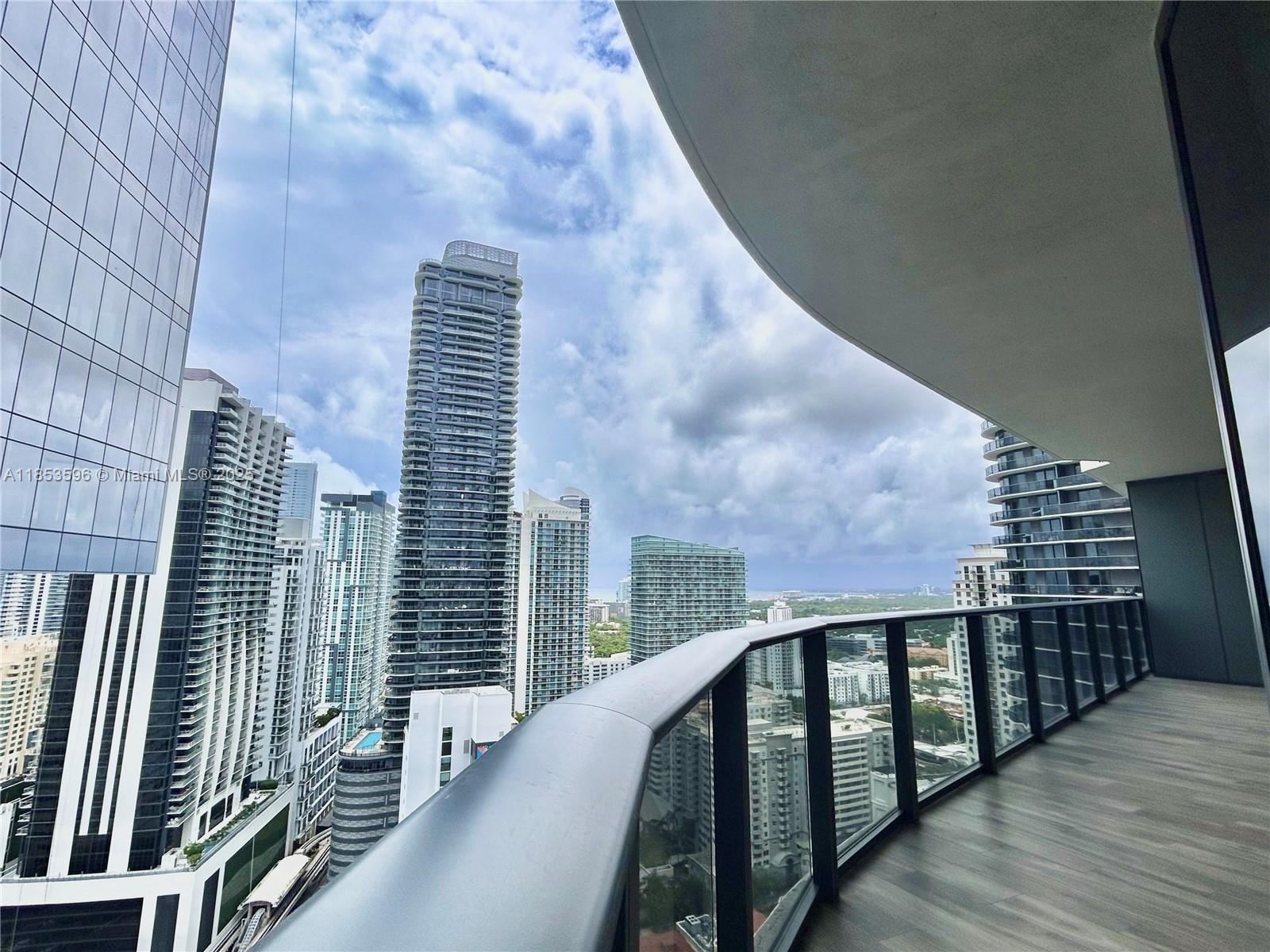 Discover this 3bed/3Bath gem at the SLS LUX Brickell, Miami's elite. Nestled in the heart of Miami's vibrant Brickell neighborhood, steps away from top-tier restaurants, upscale shopping at Brickell City Centre. The private elevator & foyer provide an additional layer of exclusivity. High ceilings & expansive windows ensure natural sunlight while the spacious wrap-around balcony showcases the city skyline & perfect for morning coffees. Developer upgrades: Master bath's marble, wine fridge, auto shades & Italkraft closets. Modern kitchen w/Subzero & Wolff appliances. Unparalleled premium amenities: Luxurious spa, cutting-edge gym, sky lounge w/fire pit, pools, cabanas, pool juice bar, dining, wine & cigar rm, putting green, sports court, rock wall, billiards, kids' area, concierge & valet