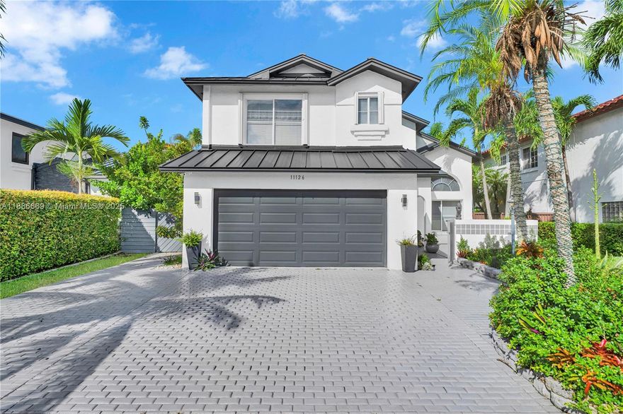 Welcome to The Hammocks! This spacious home sits on one of the largest lots in the neighborhood and features a new metal roof, updated kitchen, private pool, and a separate in-laws quarters. The low $106/month HOA includes access to a clubhouse with pool, gym, tennis, basketball, and volleyball courts along with 24/7 security. The backyard opens to a beautiful lake with a 10-mile walking path, sandy beach areas, and benches for relaxing.