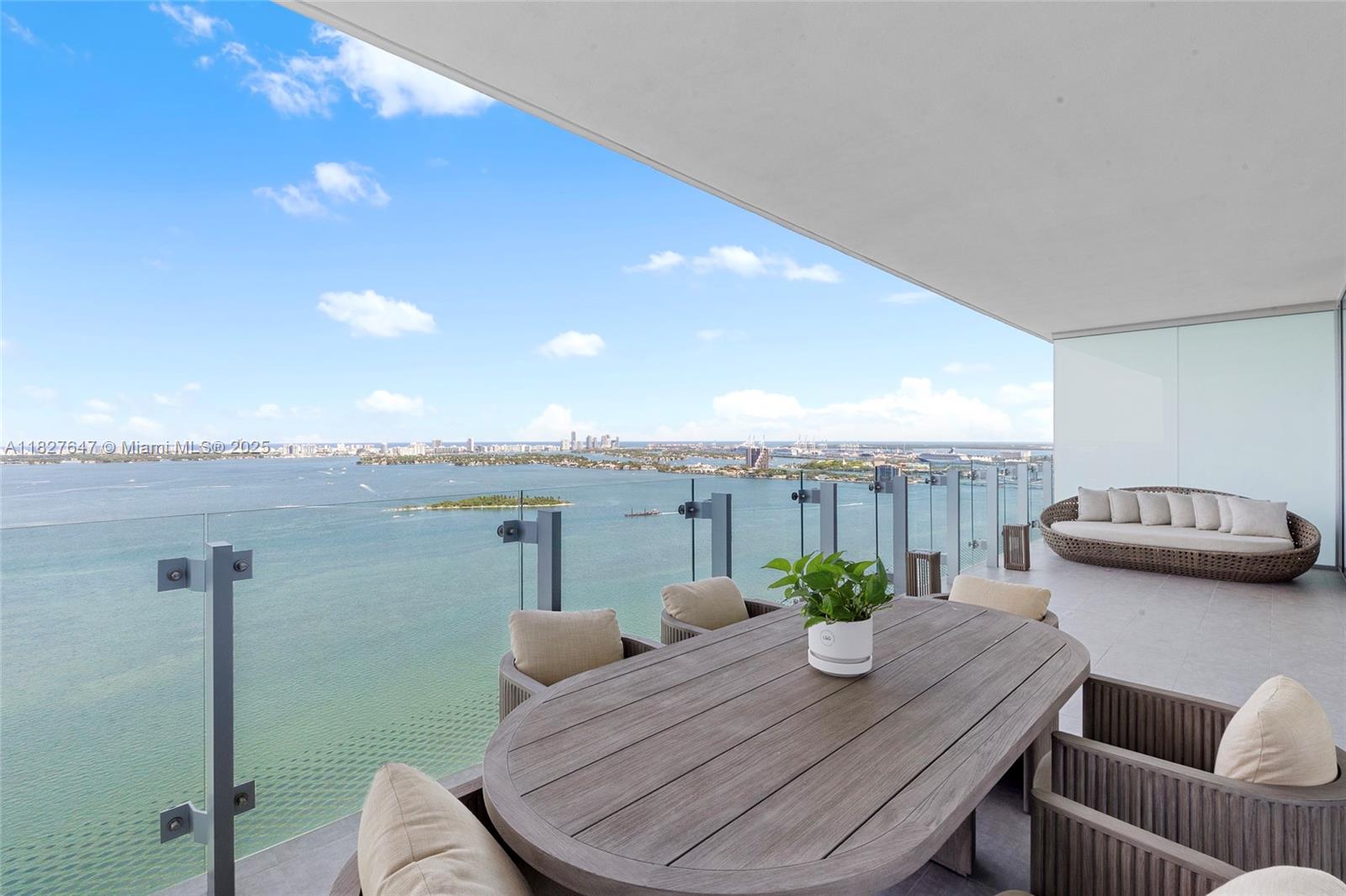 Highest-floor 01-line available—prime corner unit with floor-to-ceiling glass and stunning water views from every bedroom. This 3 bed + den (convertible 4th) & 4.5 bath residence spans 2,368 SF interior + 188 SF terrace with unobstructed bay, ocean & skyline views. Features include private elevator entry, 10-ft ceilings, marble floors, upgraded lighting, electric window shades, and abundant closet space. Chef’s kitchen with Sub-Zero, Wolf appliances, wine cooler & Italkraft cabinetry. Serene and quiet balcony setting with no street noise—ideal for relaxing or entertaining. Best price per SF in any branded new construction with direct waterfront views. Amenities include Olympic & lounge pools, bayview gym, yoga studio, spa, sauna, tennis, salon, screening room, kids’ club, pet spa & more.