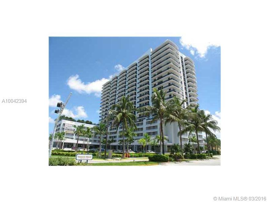Stunning SOUTH bay & city views. 1735 Sq Ft 2/2 plus den has 10 Ft ceilings with high impact windows, 20 ft private terrace, porcelain floors, Italian cabinetry, granite, ss appliances, wine cooler & large custom closets.  The luxurious marble master bath includes dual sinks, bidet, shower & massage tub.  Enjoy an infinity heated pool, well-equipped gym, billiard & social rooms, business center. 24/7 concierge. 2 assigned garage spaces, bike & extra storage. Minutes to the beach.