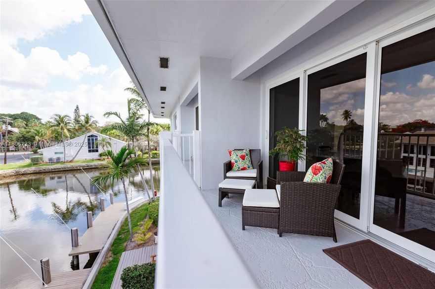 Welcome to this beautifully renovated top-floor condo offering stunning waterfront views from every room. Whether you are a 1st time homebuyer or looking for perfect weekend retreat, this rare gem has it all-including a 2nd full bathroom, an uncommon feature in the building. Step inside to find luxury vinyl plank flooring, plantation shutters & impact windows. The kitchen has shaker cabinetry, quartz countertops and modern appliances. Bathrooms are tastefully updated, and there's ample closet space. The HVAC system is 3 yrs old. Building has completed its 40 yr -work is finished and paid in full.  Maintenance includes the land lease. Docks may be rented from owners. Enjoy a walk, bike ride, or golf cart to Las Olas or beach. Don't miss your chance to own a slice paradise!