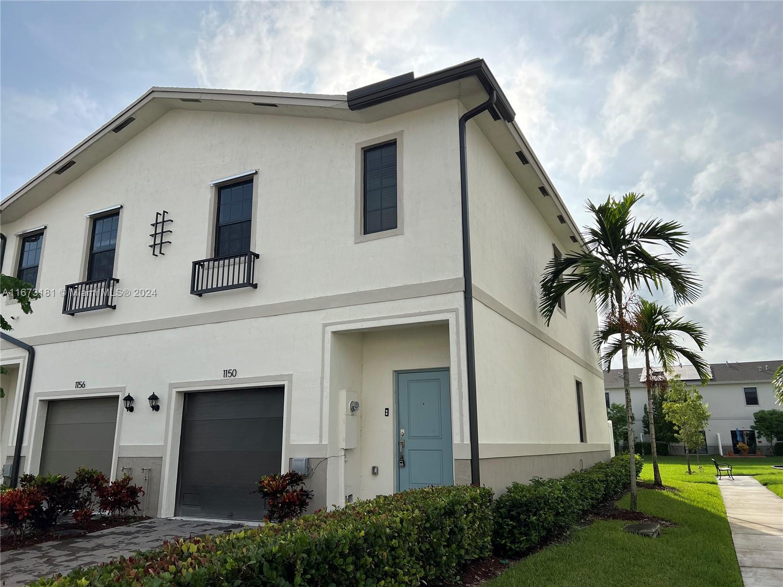 Discover the new (2022), corner-unit townhome in Regal Palm Square, perfectly situated in Florida City—your gateway to the Florida Keys! Spacious Terra model features 18" x 18" tile flooring throughout the first floor, with carpeting on the stairs and second floor. Primary suite has a walk-in closet and a private en-suite bathroom. Conveniently located upstairs, the full-size washer and dryer make laundry a breeze. Step outside to your backyard, which opens directly to a scenic walking path. Enjoy the convenience of a one-car garage with an automatic opener. Community amenities include a pool, walking paths & kids playground.