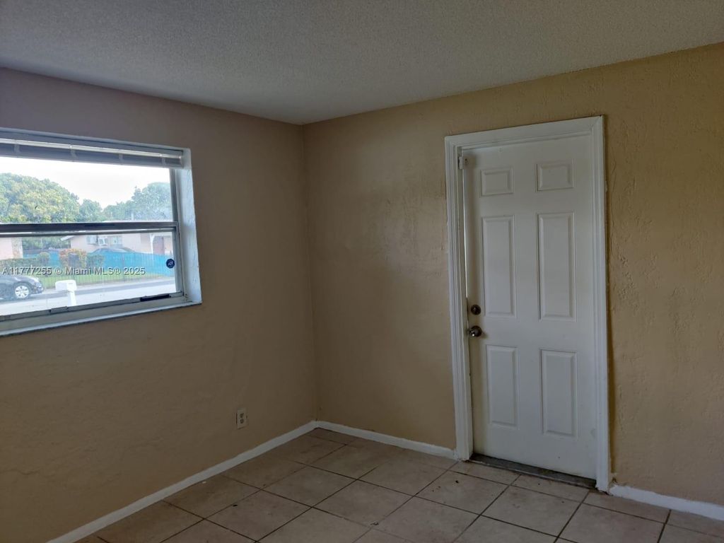 Photo of 1600 NW 15th Ct #1, Fort Lauderdale, FL 33311 (MLS # A11777255)