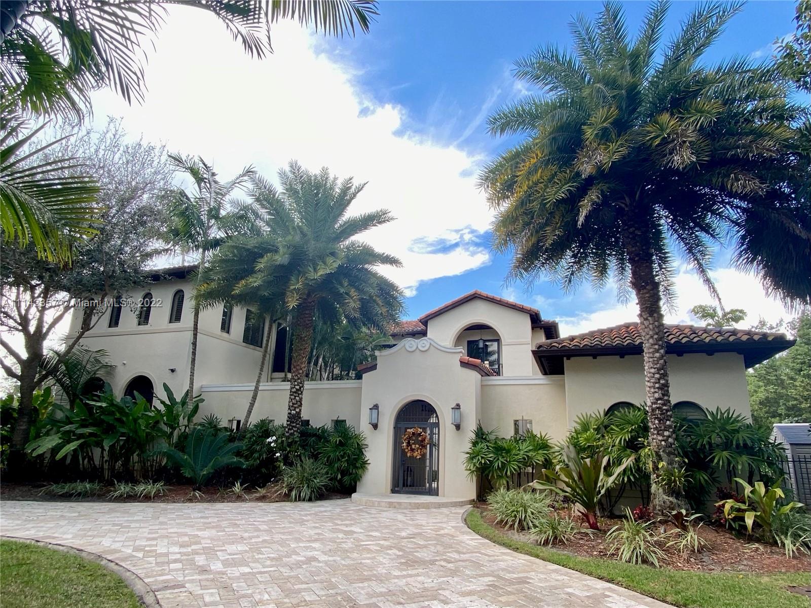 THIS GORGEOUS MEDITERRANEAN VILLA FULL OF DESIGNER FINISHES IS A MUST SEE! THIS TROPICAL PARADISE BOASTS 6 BEDROOMS AND 8.5 BATHROOMS AND COMES EQUIPPED WITH A STATE OF THE ART KITCHEN INCLUDING VIKING, SUB ZERO AND MIELE APPLIANCES. HIGH CEILINGS ARE THROUGHOUT HOME AND DINING ROOM FEATURES A TEMPERATURE CONTROLLED WINE CELLAR. ALSO FEATURES UPSTAIRS AND DOWNSTAIRS LAUNDRY ROOMS, A DETACHED GUEST ROOM WITH A FULL BATHROOM. HOME IS ELEVATOR READY.