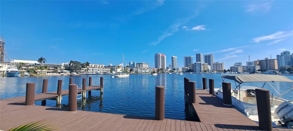 Photo of 450 Golden Isles Dr #2B, Hallandale Beach, FL 33009 (MLS # A11958591)