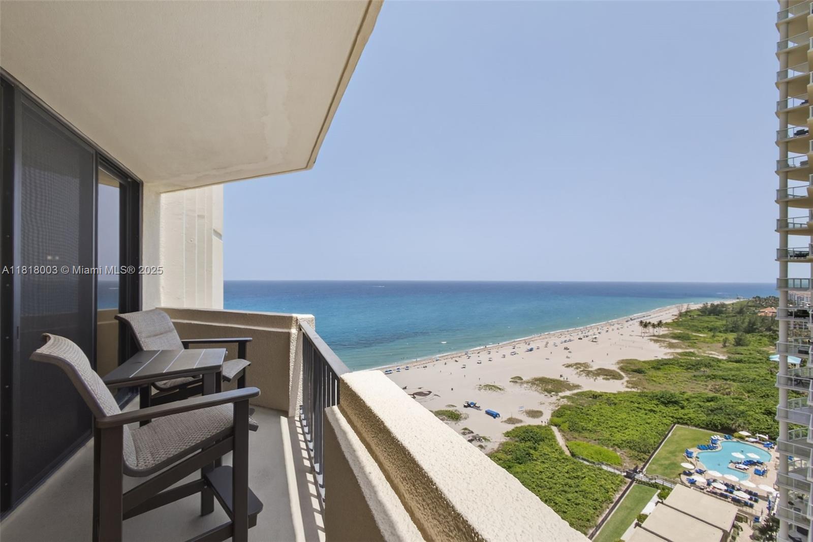 Welcome to sky-high coastal living in this stunning 20th-floor corner condo! Step into a light-filled unit where sunrise and sunset views stretch across the Atlantic and Intracoastal. This 2-bedroom residence offers an open layout, private balcony, and seamless indoor-outdoor flow. Enjoy exclusive beach access and top-tier amenities including pool, tennis courts, and fitness center in a coveted oceanfront community. This home combines coastal charm with elevated comfort.