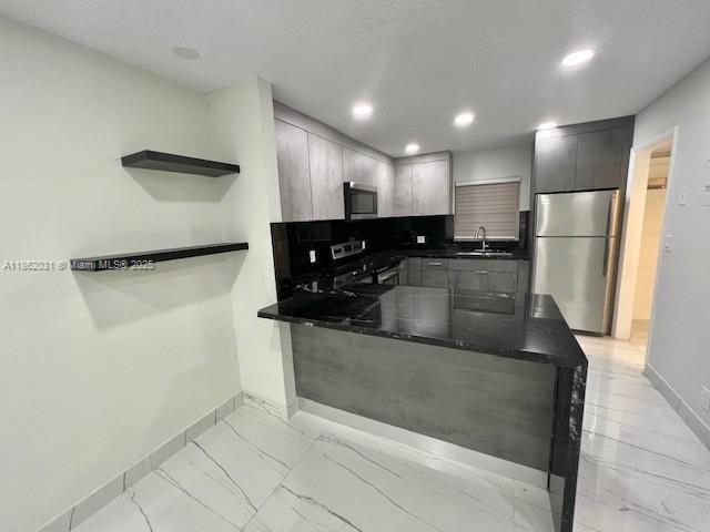 Beautifully renovated 2-bedroom, 2-bath home located in a desirable community with excellent amenities. This move-in-ready residence features modern finishes throughout, including an updated kitchen and bathrooms. Enjoy access to a community pool, clubhouse, and BBQ area, perfect for relaxing and entertaining. The community is centered around a lake, providing a peaceful atmosphere and scenic views. Ideal for comfortable living in a well-maintained neighborhood.