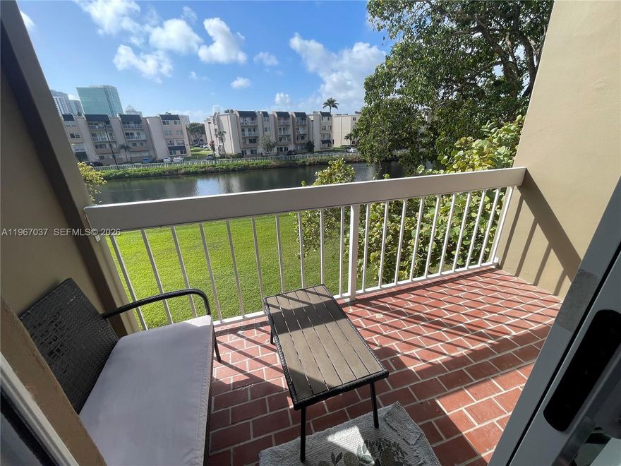 Village of Kings Creek one bedroom unit with peaceful views of the canal from its balcony and bedroom. Tile floors throughout, wood cabinet kitchen, impact windows and doors, and over 700 sq ft of living. The master has one walking closet plus a separate closet. There is a common laundry on each floor. Residents have access to the Kings Creek Clubhouse by the canal with a large pool, tennis and pickleball courts, and more. Centrally located near many shopping areas, Metrorail, Baptist, Hospital, US1, Palmetto Highway and Dadeland Mall. Parking available for up to two residents. Rental includes water and sewer.  No dogs allowed per HOA. The community requires that tenants apply directly to their office.