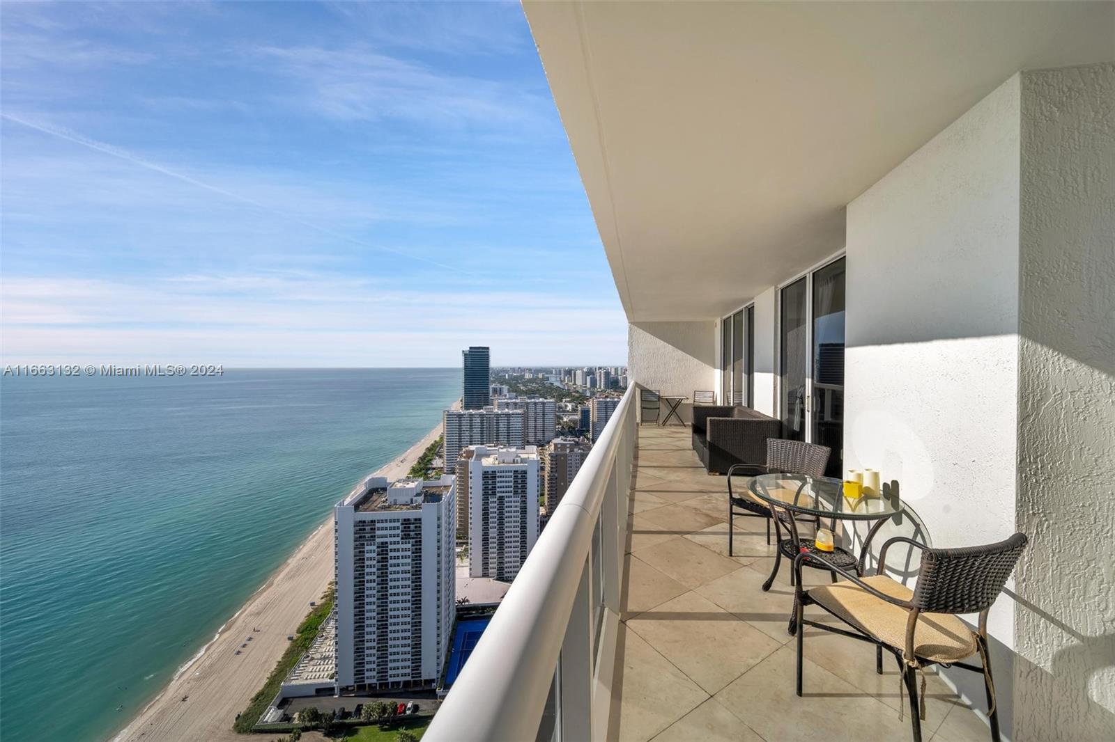 Experience luxury in this meticulously 3-bedroom, 3-bath residence with breaktaking ocean and Intracoastal views. Features include marble floors throughout, a master suite with a jacuzzi, a European-style kitchen with granite countertops and Kitchen-aid appliances, and floor-to-ceiling windows. The Beach Club provides a 5-star resort lifestyle with 24 hour valet and lobby personnel, private beach access, resort style pools, spas, gyms, lounges and a restaurant on site. Beachfront living at its finest!