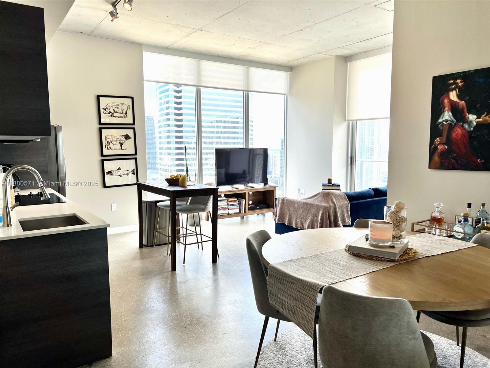 Beautiful 27th floor corner Condo located in the center of Downtown Miami. Great open floor plan, polished concrete floors, high ceilings, sleek kitchen with stainless steel appliances, in-unit full size W/D, floor to ceiling impact glass windows, lots of natural light, & balcony with stunning city views. Lux amenities include 2-story penthouse recreation area with pool table, media room, health club & spa, rooftop pool, gym, sauna/steam, residents lounge, 24/7 concierge, fob entry access, onsite pet walking area. Steps from restaurants, shops, Brickell, Bayside, and Metromover. 30 days rentals allowed & with high rental demands makes it an excellent investment opportunity. Note no parking space is included, however there is onsite valet svc or rental parking nearby.
