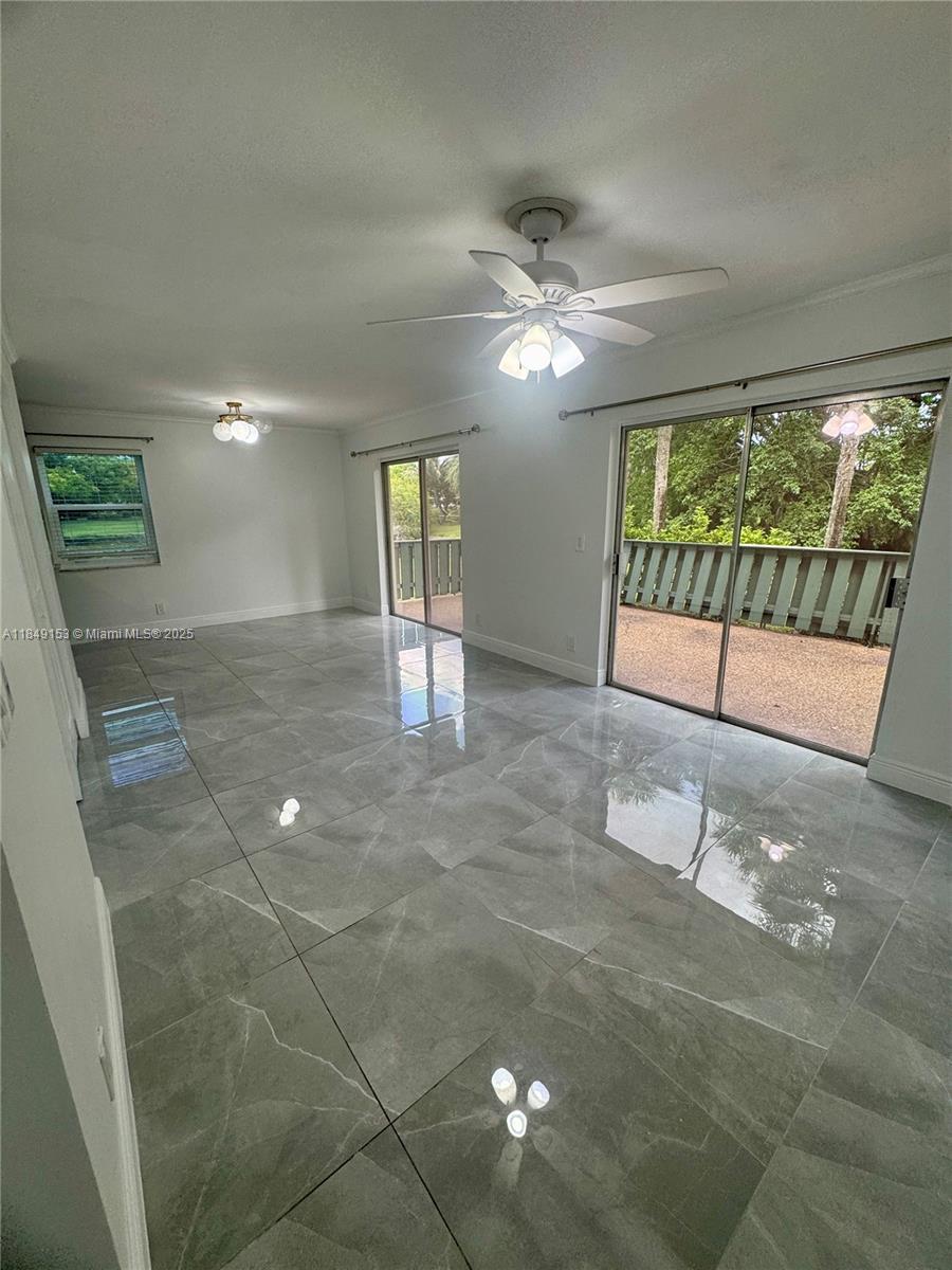 THIS BEAUTIFUL 2 BEDROOM / 2 BATH FIRST FLOOR CORNER END UNIT BOASTS AN UPDATED KITCHEN WITH STAINLESS STEEL APPLIANCES, WOOD CABINETRY, GLASS TILE BACKSPLASH & QUARTZ COUNTERTOPS. BOTH BATHROOMS HAVE NEW VANITIES. NEW TILE FLOORING THROUGHOUT LIVING AREAS & OWNER'S SUITE. TANKLESS WATER HEATER. IMPACT WINDOWS. (GLASS SLIDING DOORS & FRONT DOOR ARE NOT IMPACT GLASS.) INTERIOR FRESHLY PAINTED . FULL SIZE STACKABLE WASHER & DRYER IN THE UNIT. ROOF (2022) TRANE A/C (2017) HOME SHOWS TRUE PRIDE OF OWNERSHIP! ENJOY BEAUTIFUL SUNSETS ON THE LARGE PATIO OVERLOOKING THE LAKE OR RELAX AT THE COMMUNITY POOL. HURRY BEFORE THIS GEM IS GONE!