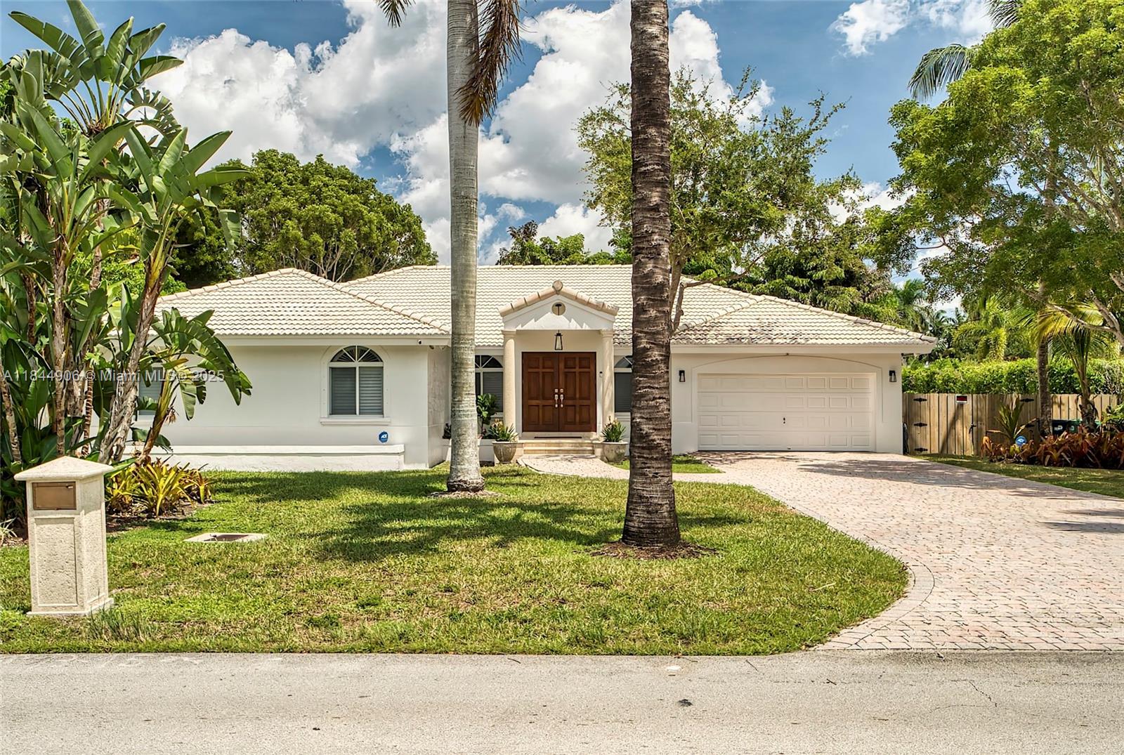 This 4-bedroom, 3-bath pool home in The Falls combines updates with exceptional outdoor living. Located on a corner lot, it offers an open layout with high ceilings, updated porcelain tile flooring, and renovated bathrooms. A separate laundry room and a fully outfitted garage with custom storage and epoxy flooring add both convenience and style.
The backyard feels like a private retreat, complete with a sparkling pool, expansive patio, covered terrace with outdoor kitchen, and basketball court—perfect for entertaining or relaxing at home. Mature landscaping adds privacy and enhances curb appeal.
Ideally located near shopping, dining, and top-rated schools, this home combines modern updates, high ceilings, and an unbeatable location—making it one of the best values in The Falls.