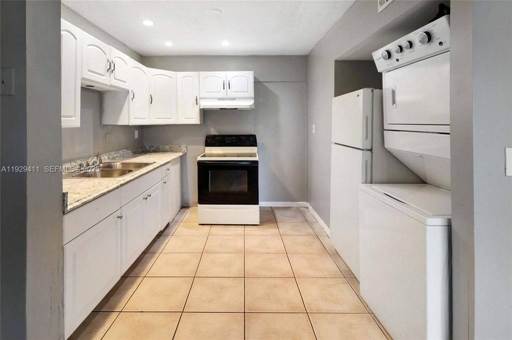 Photo of 6352 Boulevard Of Champions #1, North Lauderdale, FL 33068 (MLS # A11929411)