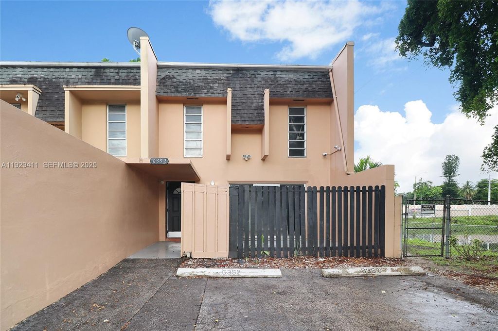 Photo of 6352 Boulevard Of Champions #1, North Lauderdale, FL 33068 (MLS # A11929411)