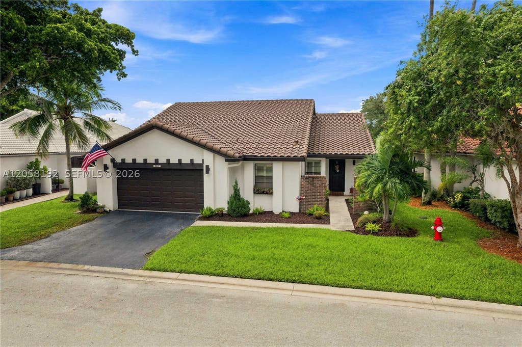 Photo of 2083 Montpeliar, Weston, FL 33326 (MLS # A12058192)