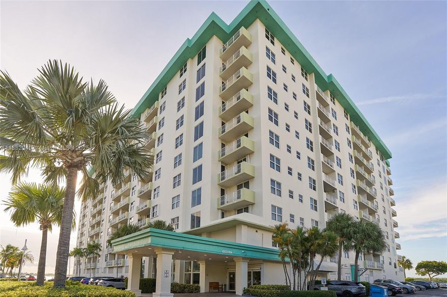 Turn-key, oversized 1BD/1BA in highly desirable Island Pointe in Bay Harbor Islands! This bright and spacious unit features an open layout with tile floors, a large kitchen with granite countertops and ample storage, plus in-unit washer and dryer. Floor-to-ceiling windows, large sliding glass doors, and a private balcony with views of the bay and even the ocean—perfect for enjoying beautiful sunrises. Large walk in closet, luxury and elegant curtains throughout the unit. Includes unique private storage unit. Well-managed, financially stable building with strong reserves. Maintenance includes cable and internet. Amenities: Bayfront pool with tiki huts, large gym, 24/7  front desk. Easy to show!