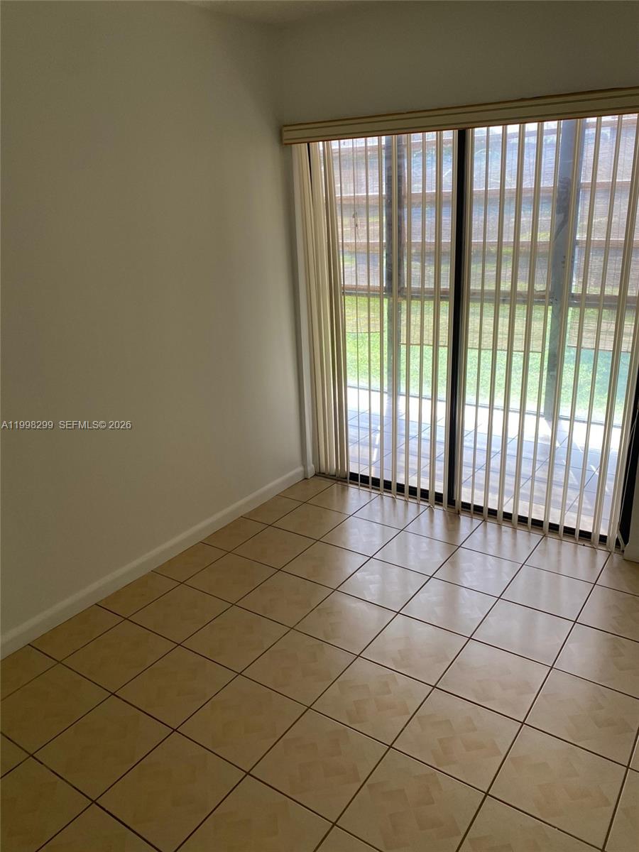 TAMARAC GARDENS CONDOMINI - Residential Lease