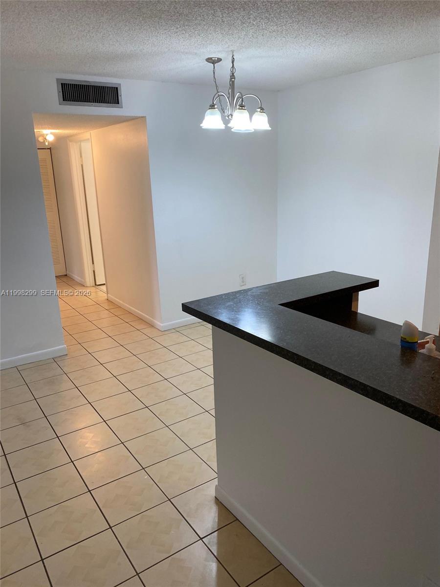 TAMARAC GARDENS CONDOMINI - Residential Lease