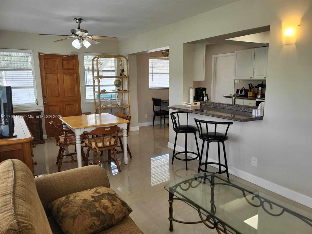 Photo of 4804 NW 49th Ct, Tamarac, FL 33319 (MLS # A11790111)