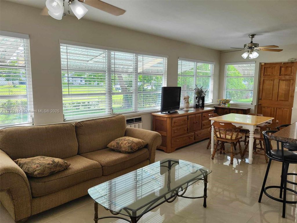 Photo of 4804 NW 49th Ct, Tamarac, FL 33319 (MLS # A11790111)