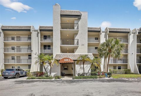 Photo of 9235 Lagoon Pl #404, Davie, FL 33324 (MLS # A12003462)