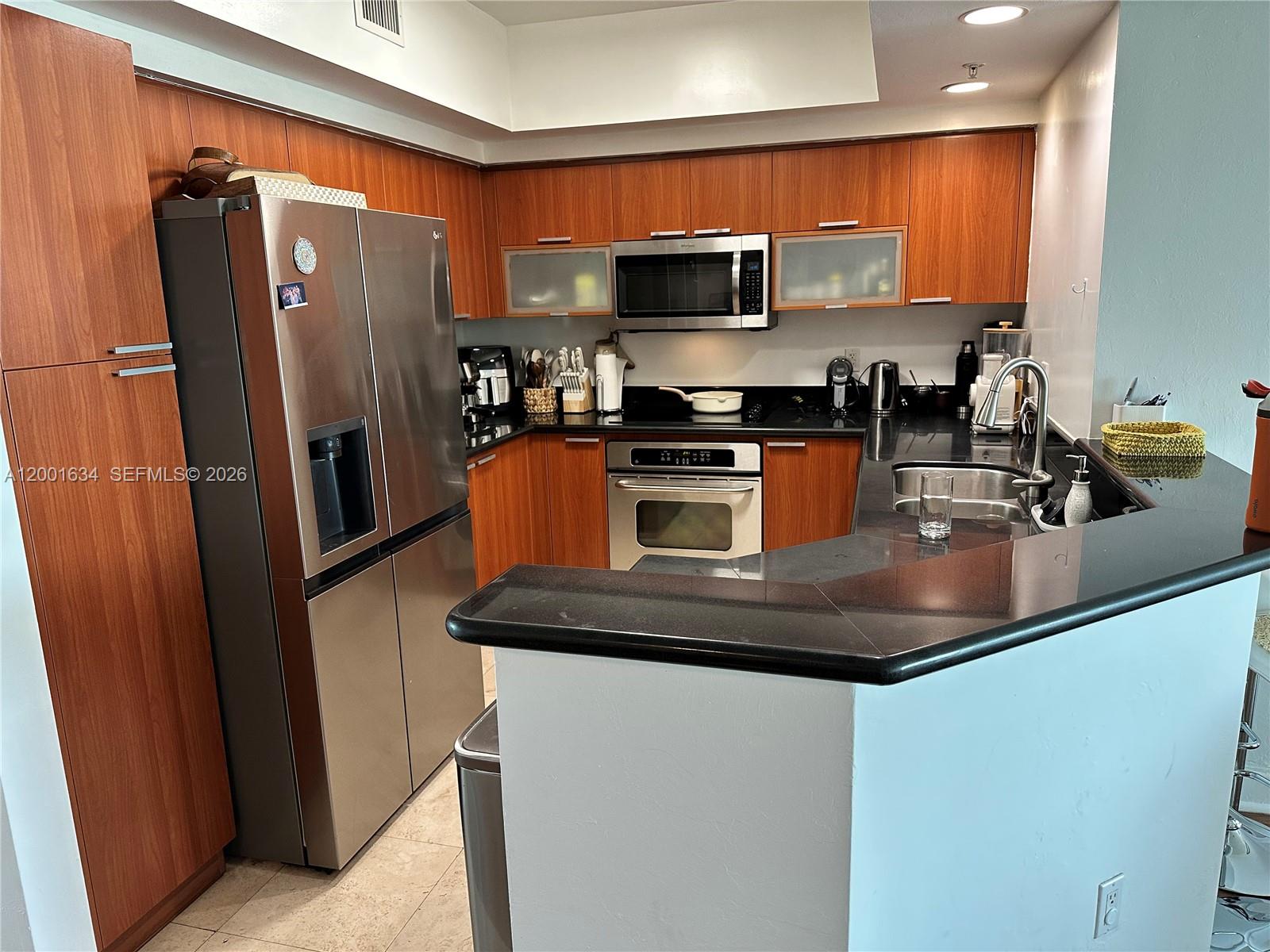 THE OAKS I CONDO - Residential Lease