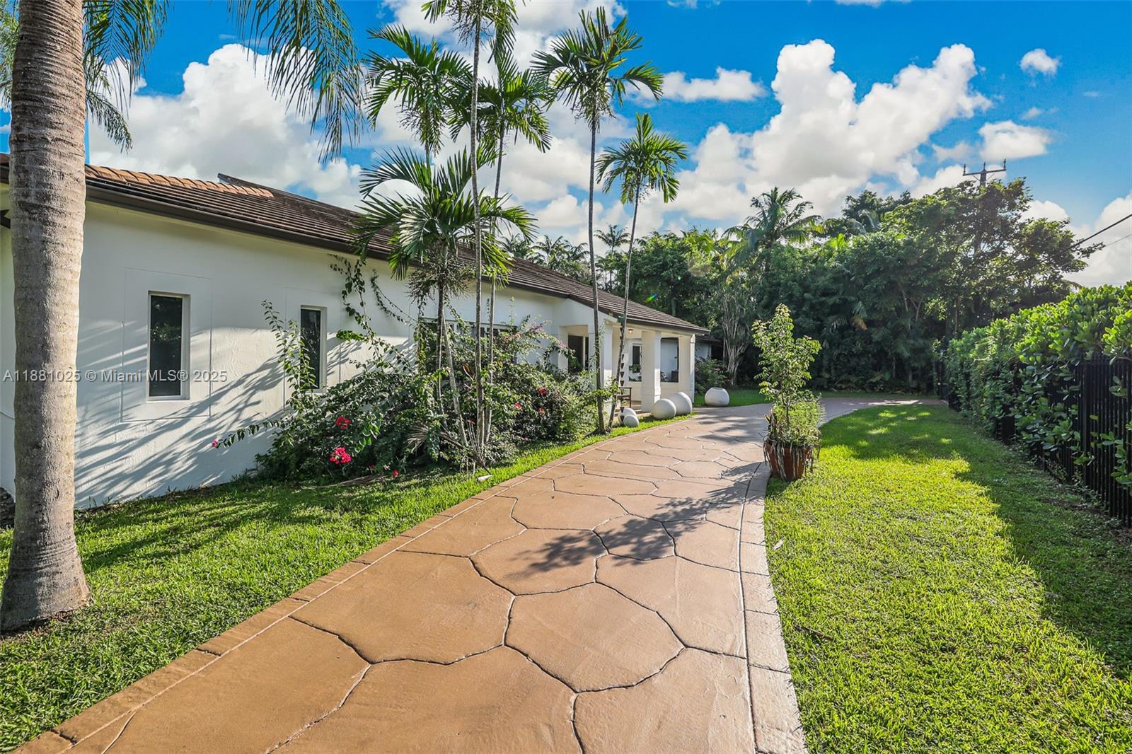 This rare $2.6M estate in the heart of Miami sits on over 50,000 SQFT (1.15 acres) of land and offers the perfect blend of luxury and functionality. Featuring 11 total rooms and 9 bedrooms, the property includes a private guest house with its own full kitchen and separate driveway. Outdoors, it's an entertainer's dream with a volleyball court, tennis court, basketball court, outdoor firepit area, and sparkling pool. The roofs and AC units are only about 4 years old, providing peace of mind. Whether you're envisioning two families living comfortably together or transforming the grounds into a short-term rental oasis, this property offers unmatched versatility in one of Miami's most central locations.