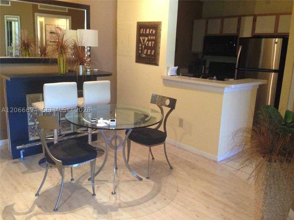 Photo of 2880 N Oakland Forest Dr #313, Oakland Park, FL 33309 (MLS # A12066694)