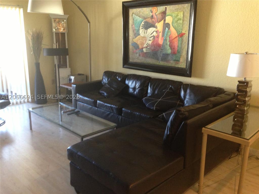 Photo of 2880 N Oakland Forest Dr #313, Oakland Park, FL 33309 (MLS # A12066694)