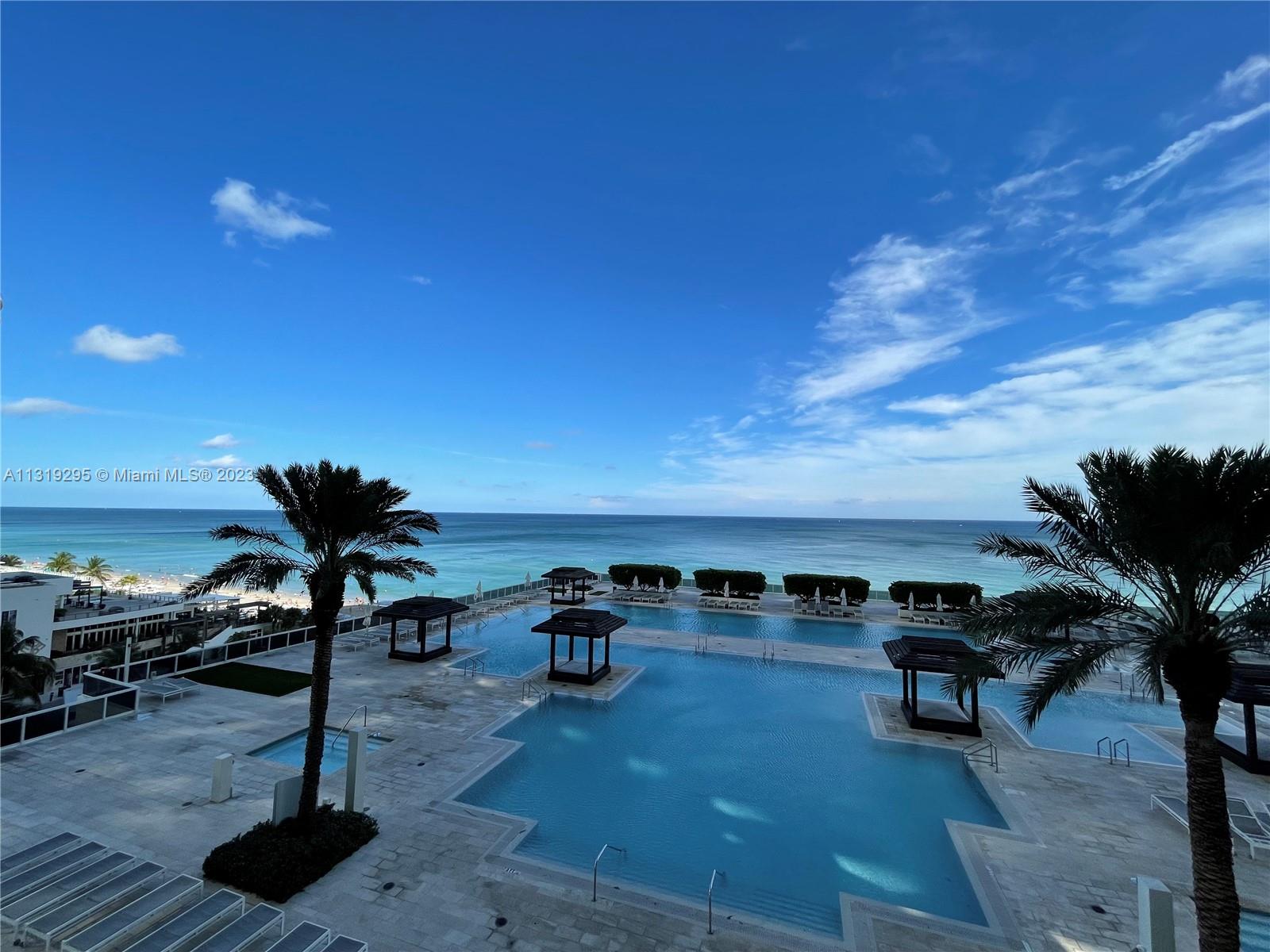 This is a beautiful fully furnished apartment 1841 sqf with 3 bedroom (one is the den), 3 full bathrooms, 3 walk in closets and 2 additional closets. DIRECTLY OCEAN VIEW from all windows. This unit offers a NEW fully equipped kitchen with the nice breakfast area. The famous complex BEACH CLUB allows you to enjoy a magnificent lobby, full time concierge and security, 5 heated pools, SPA and fitness center. There are 1 covered parking space and 1 valet parking.