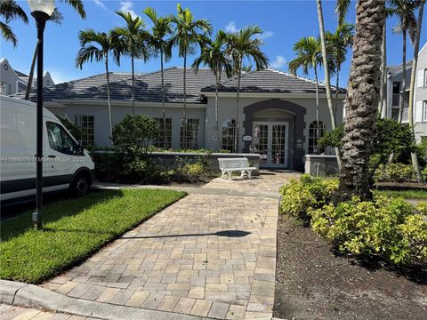 Photo of 620 SW 111th Ave #107, Pembroke Pines, FL 33025 (MLS # A11866376)