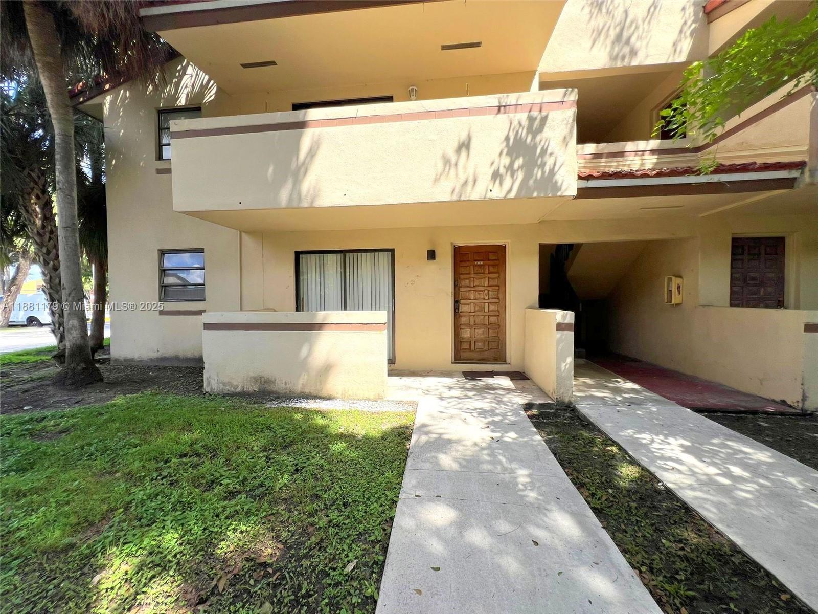 Bright and spacious corner condo featuring a convenient in-unit washer and dryer. Open living area with tile flooring throughout. Updated bathrooms for modern comfort. The primary suite offers a large walk-in closet. Amenities include a community pool.