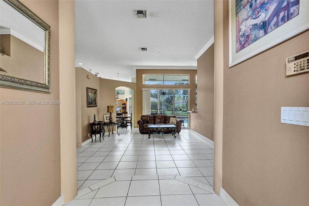 Photo of 4921 NW 112th Dr, Coral Springs, FL 33076 (MLS # A12005238)