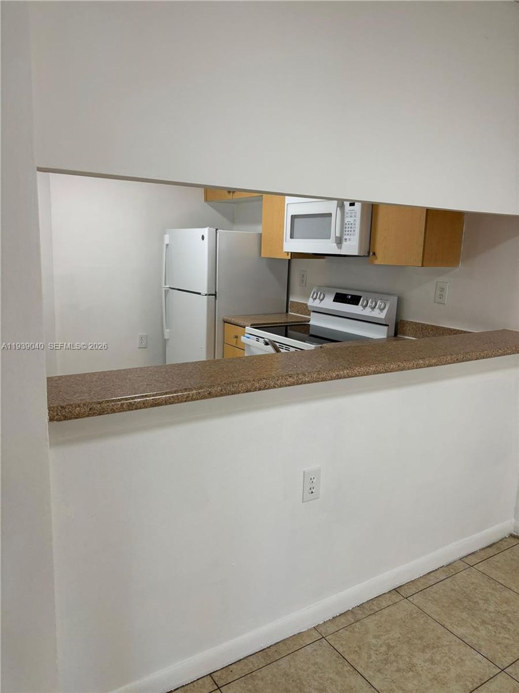 Photo of 947 Lake Terry Dr #D, West Palm Beach, FL 33411 (MLS # A11939040)