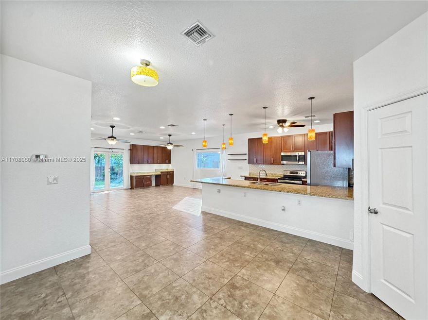 This 3-bedroom, 2-bath home, built in 2013, offers 1,674 sq ft of modern living space in the heart of Dania Beach. Set on a spacious 7,053 sq ft lot, it’s perfectly situated for easy access to the beach, airport, and nearby amenities. The open floor plan features a bright and airy living area, a well-equipped kitchen, and comfortable bedrooms. Ideal for those seeking a centrally located home with a blend of convenience and contemporary style. Perfect for both relaxation and entertaining.